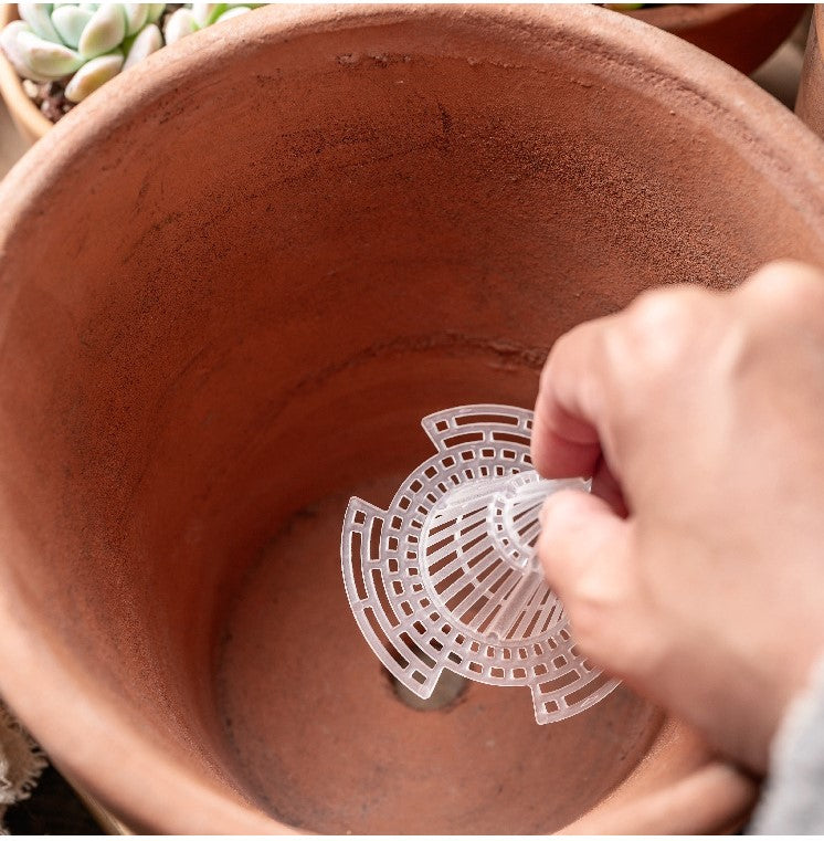 Dispositif de drainage de jardinière anti-pourriture des racines