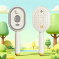 Brosse à cheveux électrique avec pulvérisateur et massage