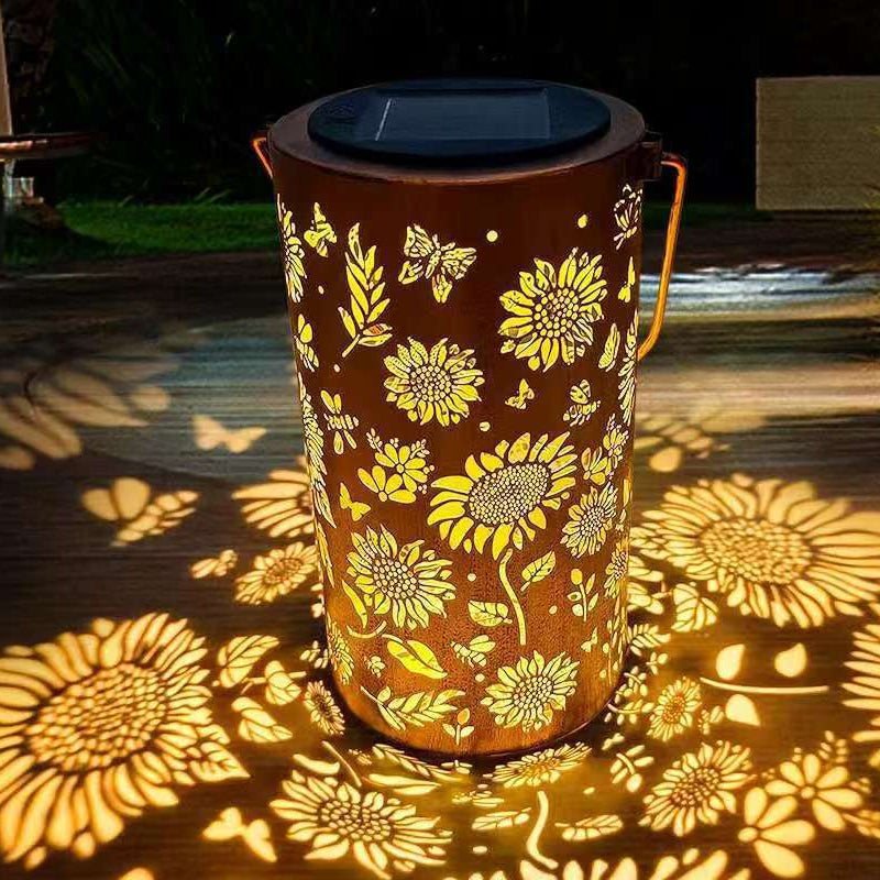 Lanterne solaire suspendue avec motifs ajourés