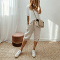 Pantacourt femme en coton et lin – Ample, coupe courte, revers roulotté, poches