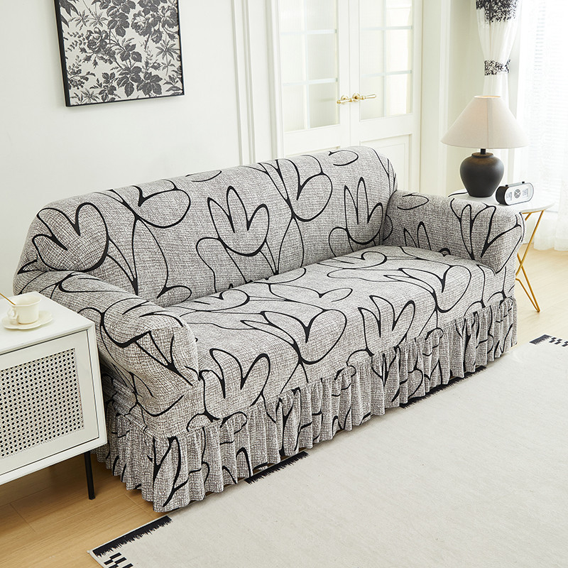 Housse de canapé très extensible – Ourlet volanté et protection complète