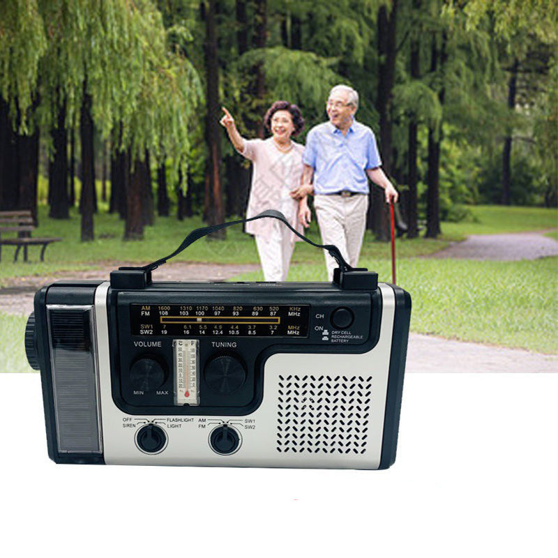 Lampe de poche radio d'urgence portable à manivelle