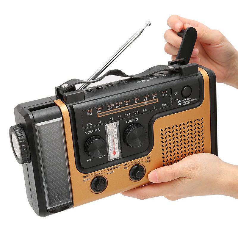 Lampe de poche radio d'urgence portable à manivelle